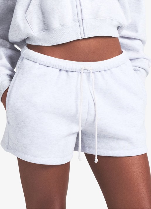 SKIMS Cotton Fleece low waist loose fit korte broek met steekzakken