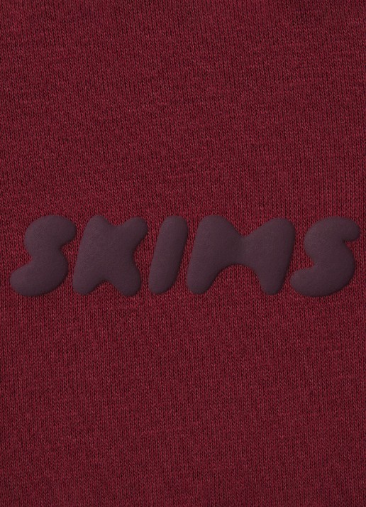 SKIMS Cotton Fleece low waist straight fit joggingbroek met logo - detail 6 bordeauxrood