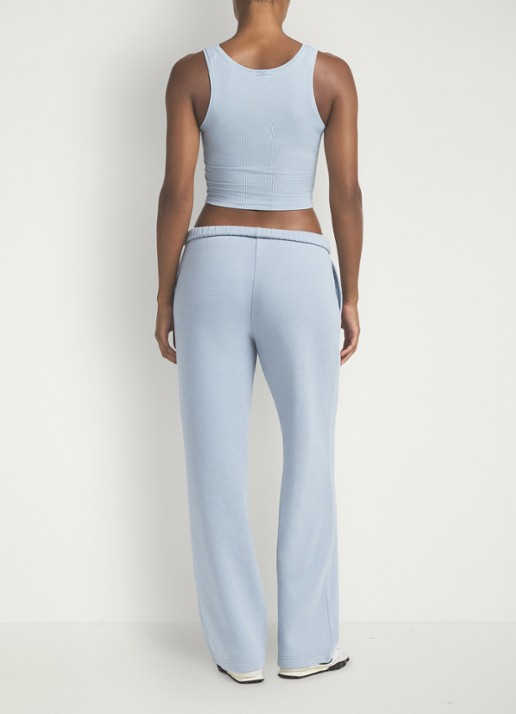 SKIMS Cotton Fleece low waist straight fit joggingbroek met logo - achterkant 7 lichtblauw