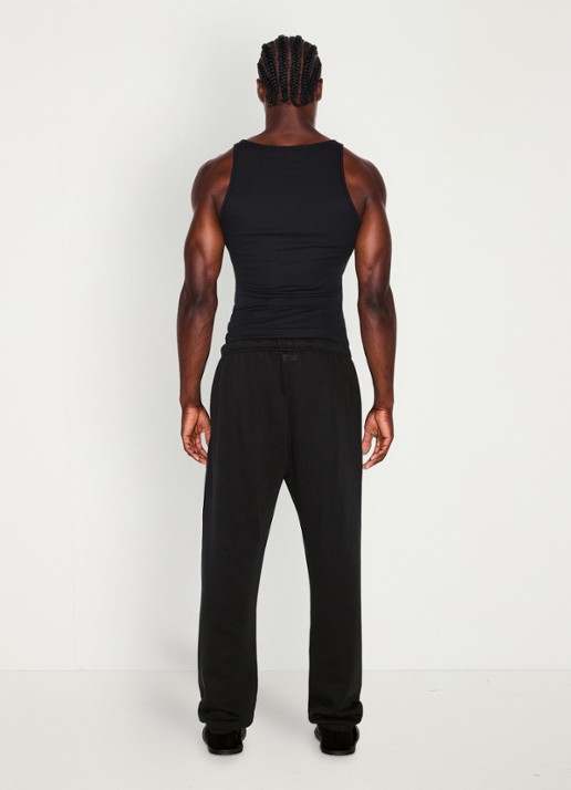 SKIMS Fleece Lounge joggingsbroek met steekzakken - achterkant washed onyx