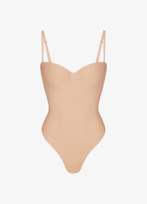 SKIMS Skims Body corrigerende stringbody met beugel - voorkant beige