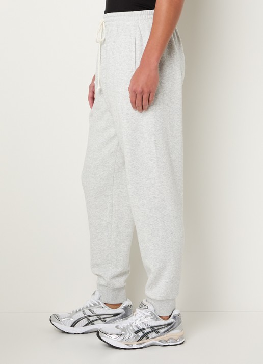 SKIMS Tapered fit joggingbroek met steekzakken - detail 5 light heather grey