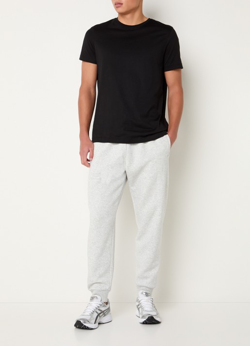 SKIMS Tapered fit joggingbroek met steekzakken - voorkant 3 light heather grey