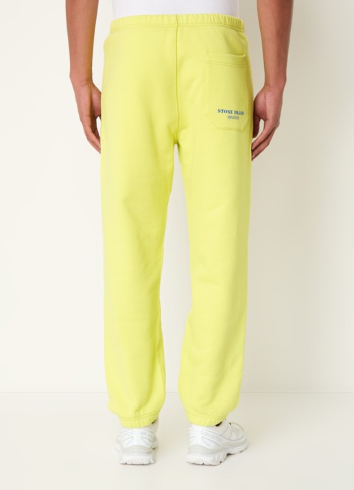 Stone Island 632X5 tapered fit joggingbroek met steekzakken - achterkant citroengeel
