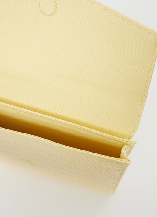 Ted Baker Crocey clutch met crocostructuur - detail 2 lichtgeel