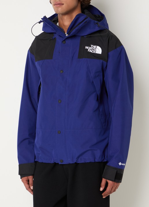 The North Face Gtx windjack met capuchon en ritszakken - detail blauw