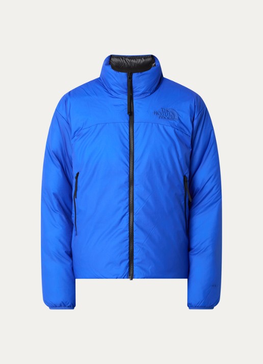 The North Face Reversible pufferjack met donsvulling en steekzakken - voorkant blauw