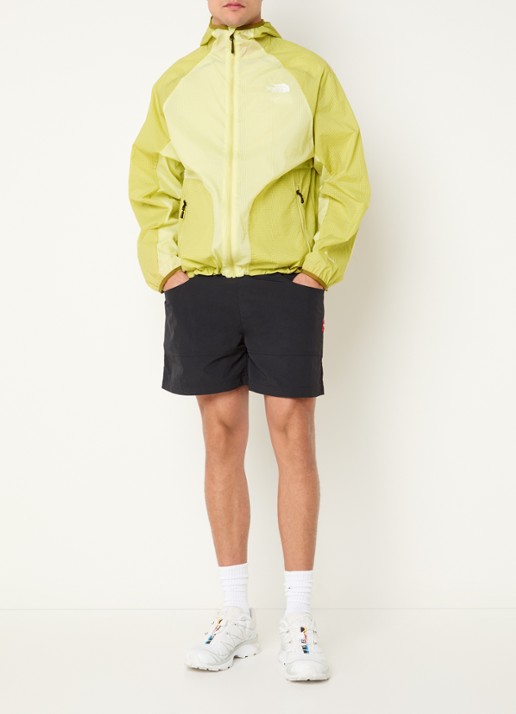 The North Face Windjack met capuchon en ritszakken - voorkant 4 lichtgroen