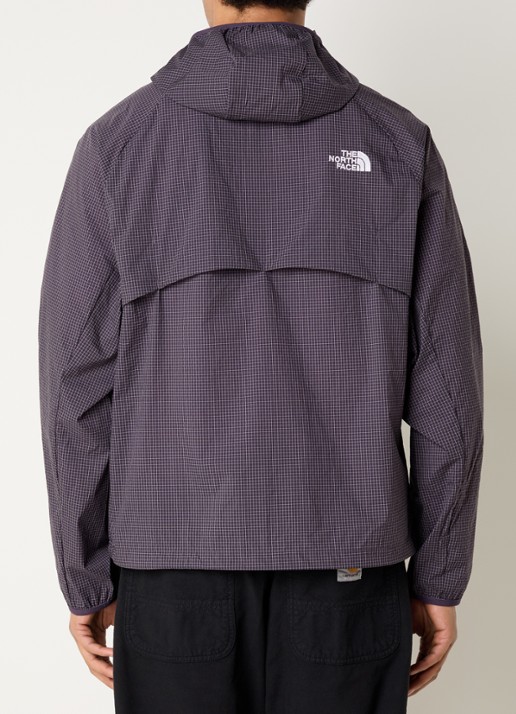 The North Face Windjack met capuchon en ritszakken - achterkant paars