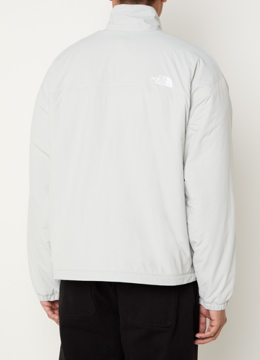 The North Face Yumiori reversible jack van teddy met ritszakken - achterkant 5 lichtgrijs