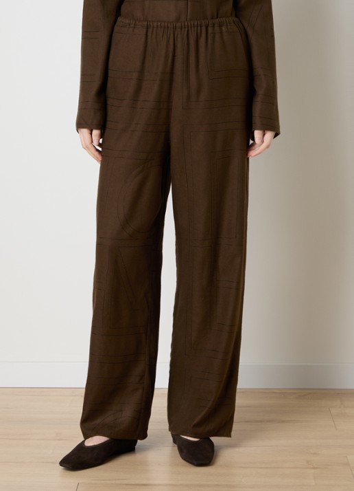 TOTEME High waist loose fit pantalon met logoborduring