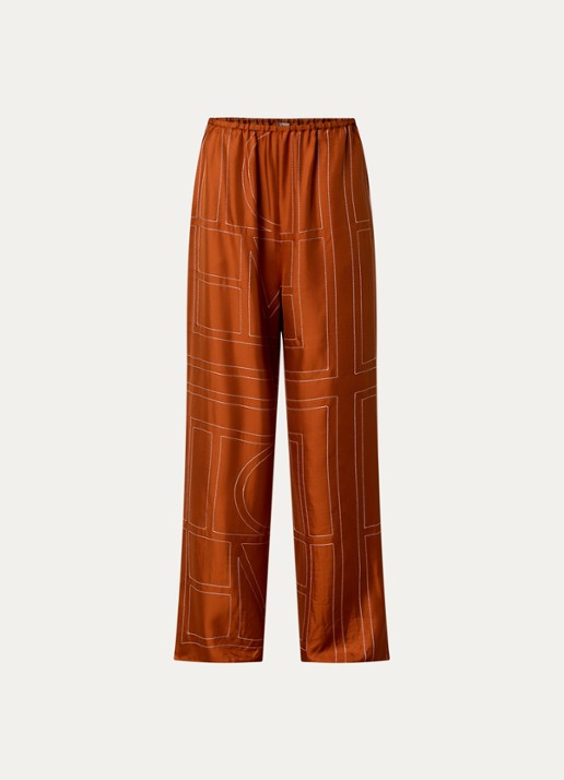 TOTEME High waist loose fit pantalon van zijde met logoborduring - voorkant 4 oranjebruin