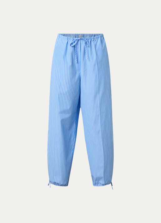TOTEME High waist tapered fit broek met streepprint en gestrikt detail - voorkant 4 lichtblauw