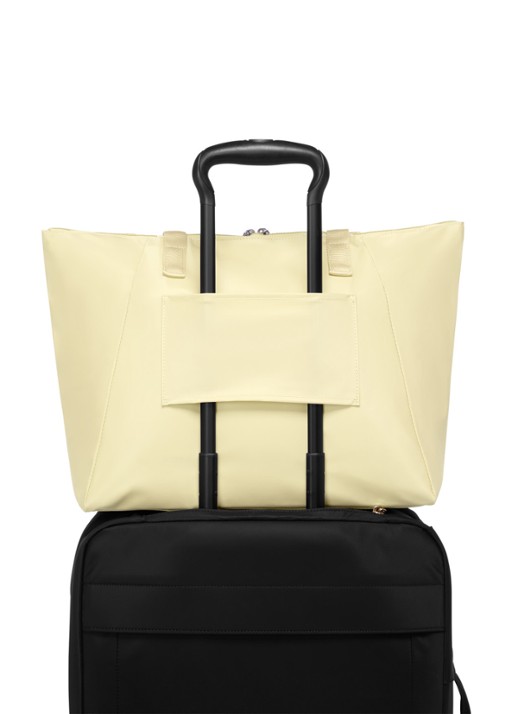 TUMI Just In Case Medium schoudertas met uitneembaar etui - detail geel