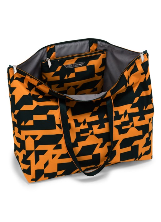 TUMI Just In Case schoudertas met uitneembaar etui - voorkant 2 oranje
