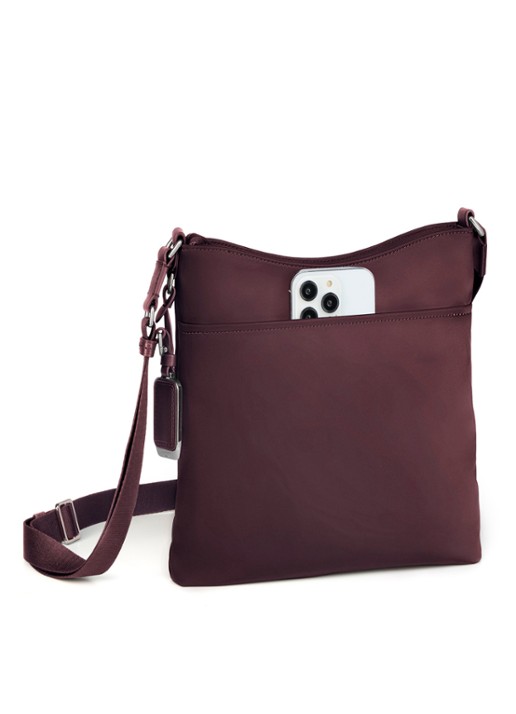 TUMI Voyageur Tyler crossbodytas met logoborduring - detail bordeauxrood