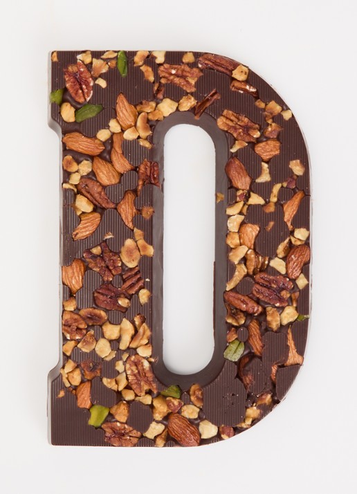 Urban Cacao Pure chocoladeletter met noten 180 gram - voorkant 2 d