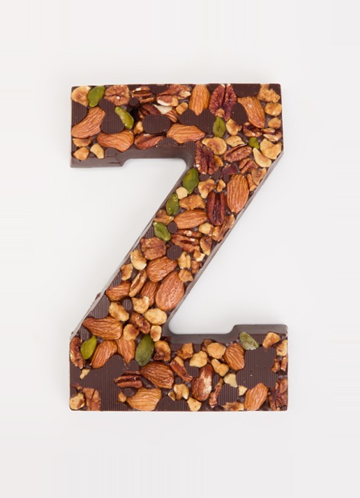 Urban Cacao Pure chocoladeletter met noten 180 gram - voorkant 2 z