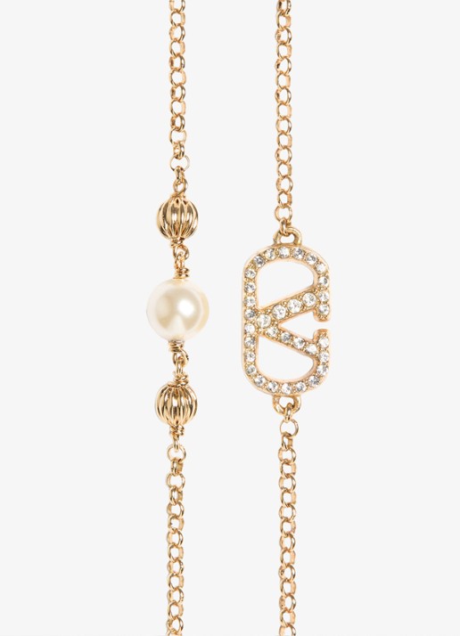 Valentino Garavani Armband met logo en kristal - detail goud