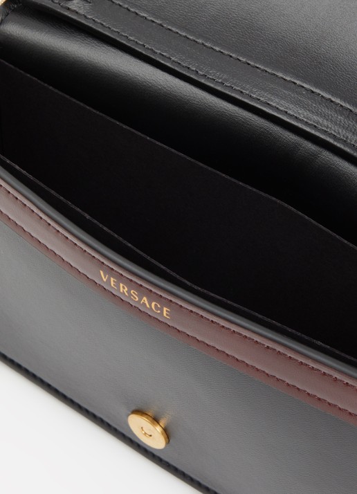 Versace Emblème clutch van lamsleer met afneembare schouderriem - detail zwart
