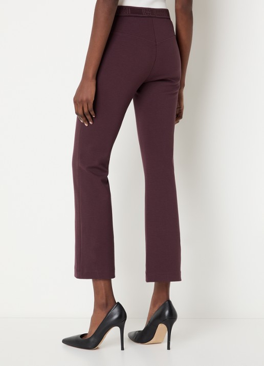 Wolford Grazia high waist cropped flared fit broek met siernaad - achterkant aubergine