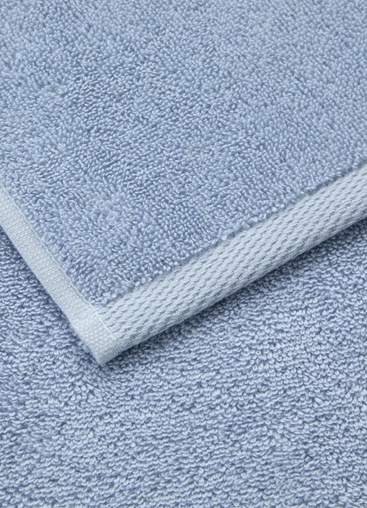 Yves Delorme Rameau badhanddoek - 450 gr/m2 - 70 x 140 cm - achterkant lichtblauw