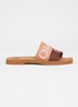 Woody slipper van canvas met logo - Roze