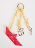 Tasbedel met leren detail - Geel