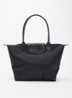 Le pliage One schoudertas M met details van leer - Zwart