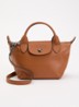 Le Pliage Xtra handtas XS van leer - Oranjebruin