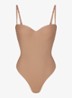 Skims Body corrigerende stringbody met beugel - Taupe